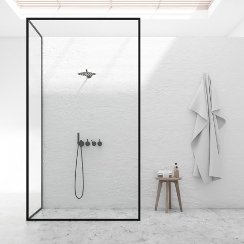 Interior of stylish bathroom with white walls, stone floor, shower stall with glass walls and chair with towels and bottles. 3d rendering